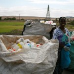 Ladies bring recycling then volunteer at swop shop