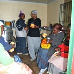 Sharon serving hot yummy soup.